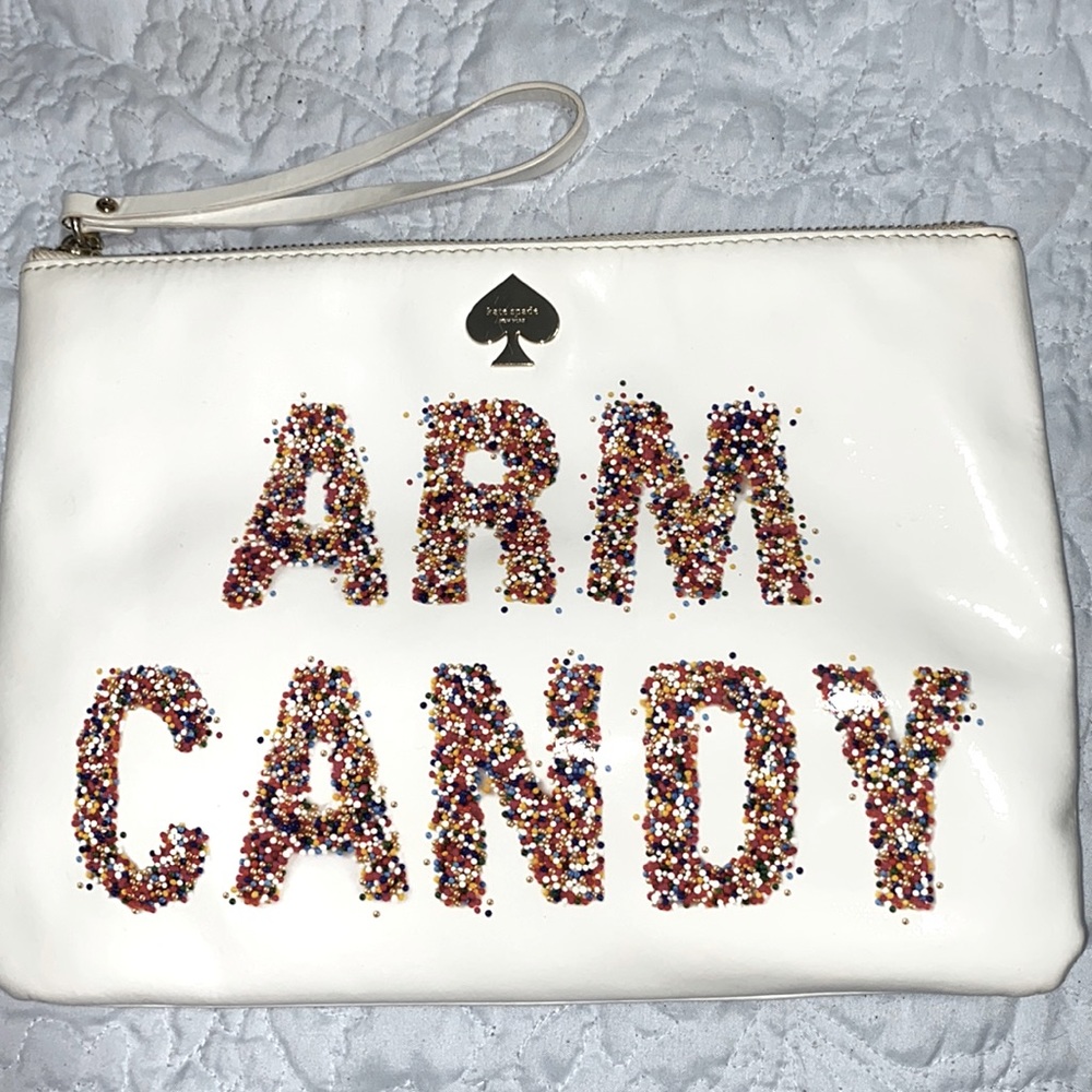White Kate spade clutch/wristlet with dust bag